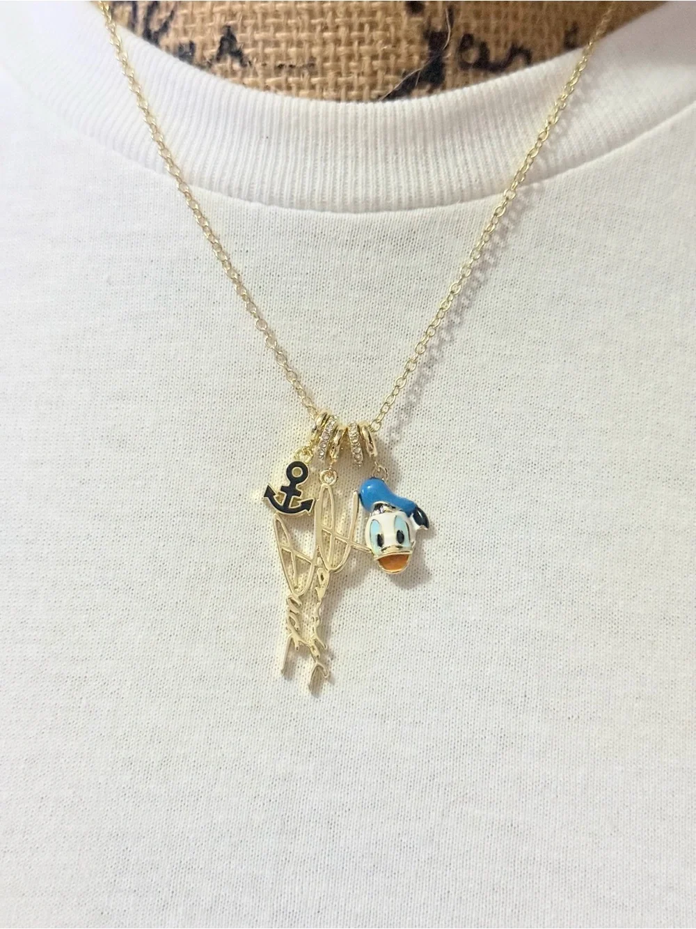 Disney Gold-Tone Donald Duck Charm Necklace with Blue Accent